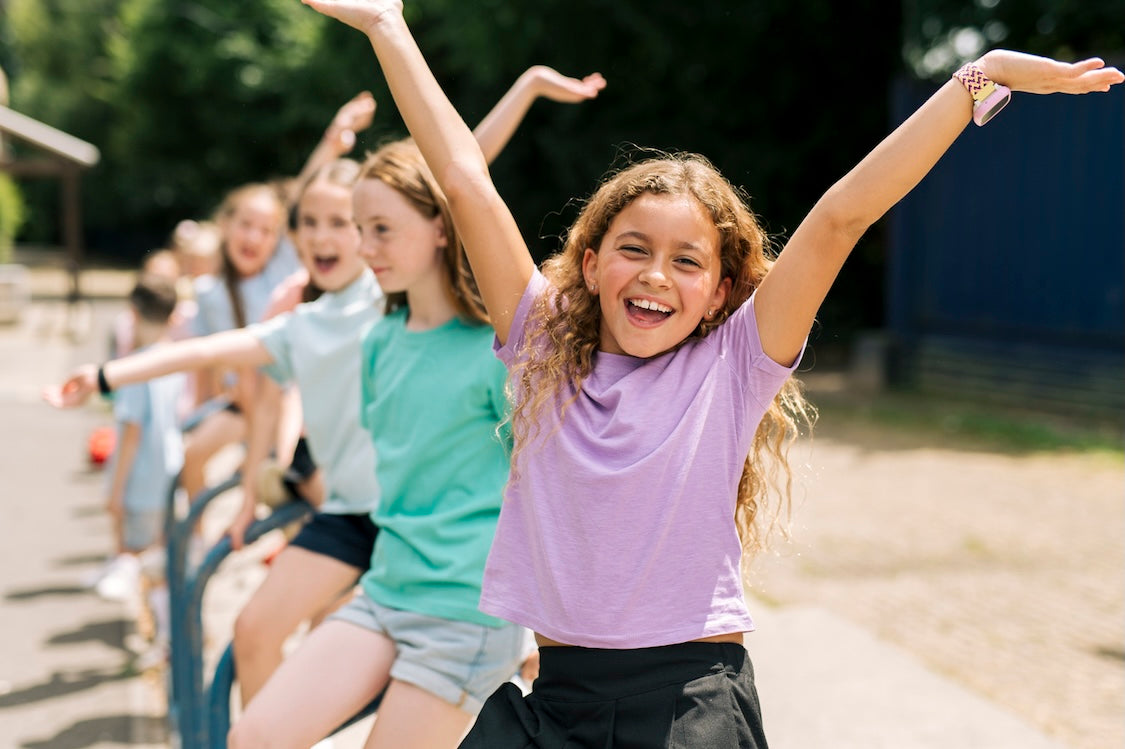 School kids staying active with their kids smartwatches from Xplora in school mode.