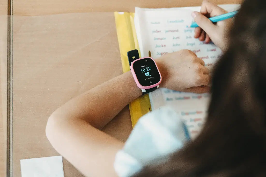 Girl attending class with her kids smartwatch in school mode. No noise, no internet, no social media
