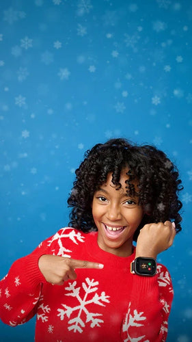 Girl pointing at her new kids smartwatch in the color black with an incomin call from mom