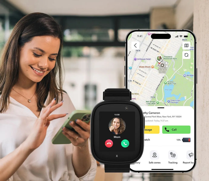 A smiling woman in a white blouse holds a smartphone while interacting with a location-tracking app. In the foreground, a black smartwatch displays an incoming call from 'Mom.' A smartphone screen in the background shows a detailed GPS map interface with tracking options, safe zones, and communication features. The image highlights the Xplora Guardian App, designed for parental monitoring and child safety.