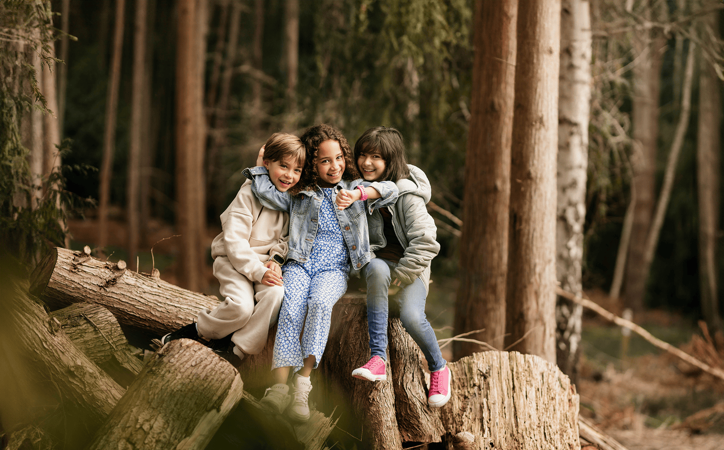 Kids in the forest with smartwatches